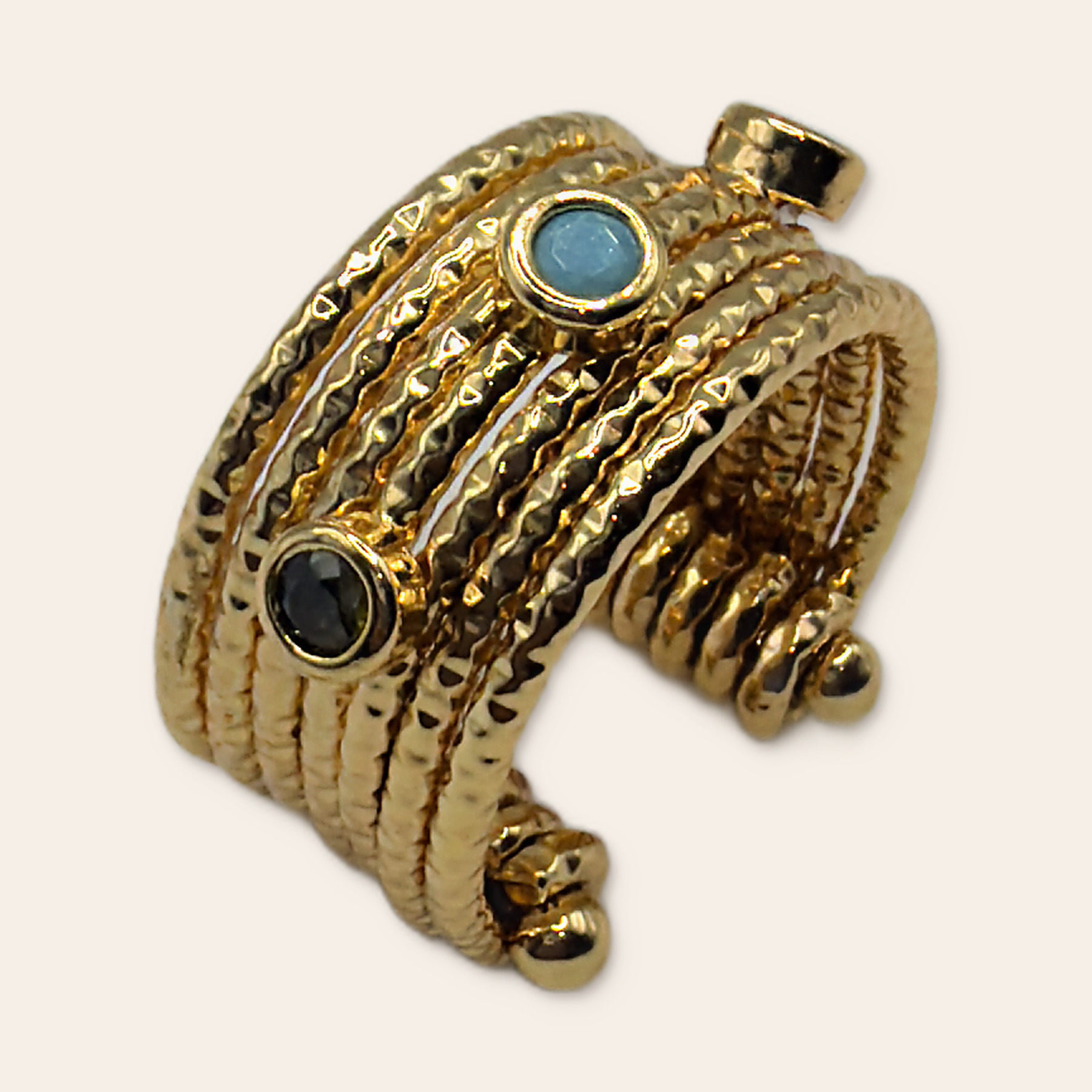 Textured multi-band cuff on a Simie ecru background